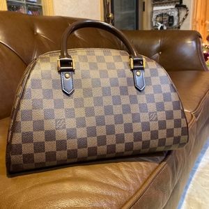 Brand NEW never used Louis Vuitton Dr Bag